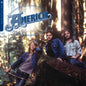 America - Now Playing LP (Transparent Green Colored Vinyl)